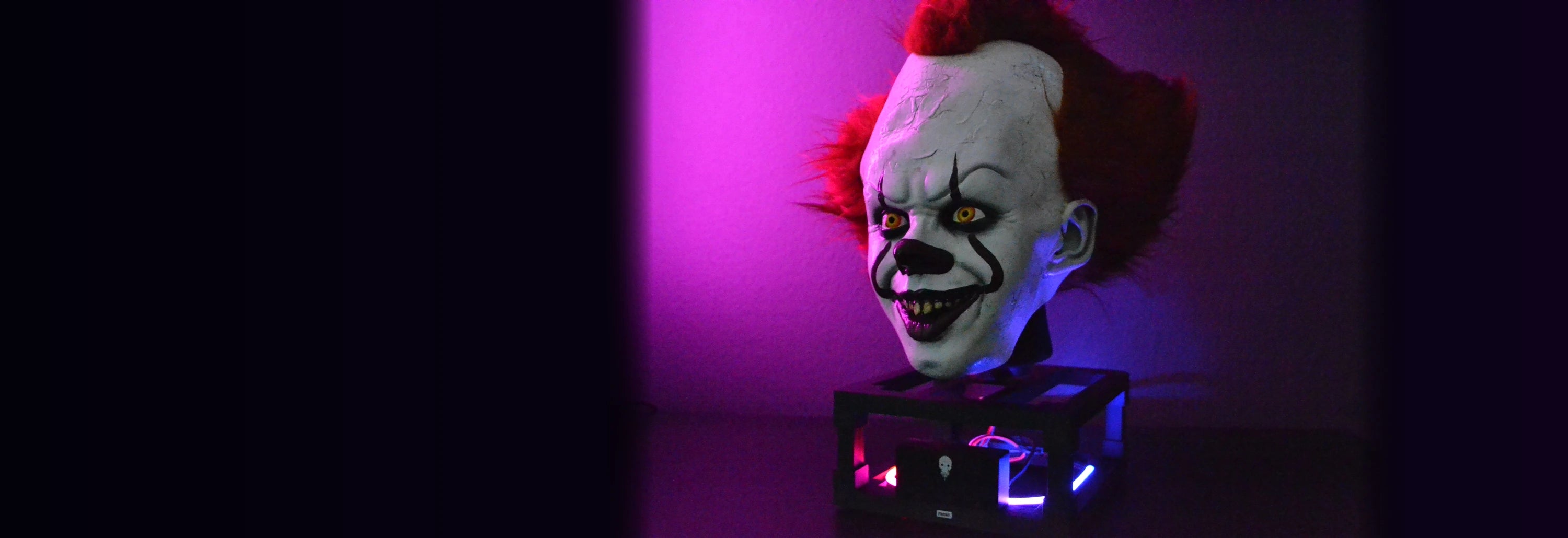 Follow Me Fright illuminated creature head mounted above its control base